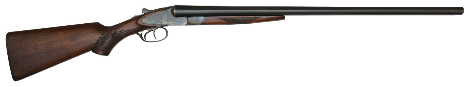 VERY GOOD ORIGINAL L.C. SMITH FIELD GRADE 12 BORE SHOTGUN.: SN. FW58570. Cal. 12ga. Built with 28" brls that have slightly raised matted concave top rib with brass front bead. Top of brls with usual maker's stamps. Walnut splinter forend is point pat