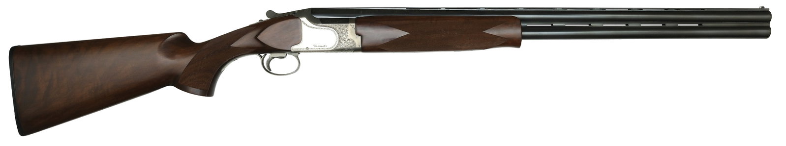 WINCHESTER MODEL 6500 SPORTER 12 BORE SHOTGUN.: SN. K548677E. Cal. 12ga. Built with 28" brls that have slightly raised matted ventilated top rib with white front bead. Mid rib is also ventilated. Schnabel tipped walnut forend is point pattern 