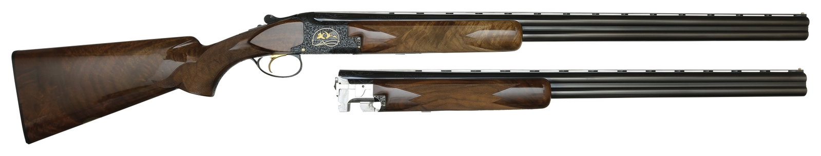 FABULOUS BROWNING MIDAS GRADE 20 BORE TWO BARREL SET WITH CASE.: SN. 4939V74 Cal. 20 ga. Built in 1974. Brl Set 1 with 26-3/8” ventilated rib that has white front bead and gold number “1”. Chokes stamped IC & Mod. Brl Set 2 with 28" ventilate