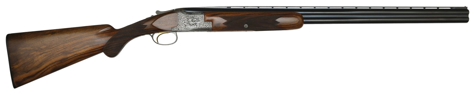 EXTREMELY RARE EARLY PRODUCTION BROWNING SUPERPOSED GRADE V 20 BORE FIELD GUN WITH ORIGINAL BOX AND: TOLEX CASE. SN. 4293. Cal. 20ga. Built with 28" brls that have slightly raised matted ventilated to rib with brass front bead. Tops of brls with usual early maker's stamps and breech ends an
