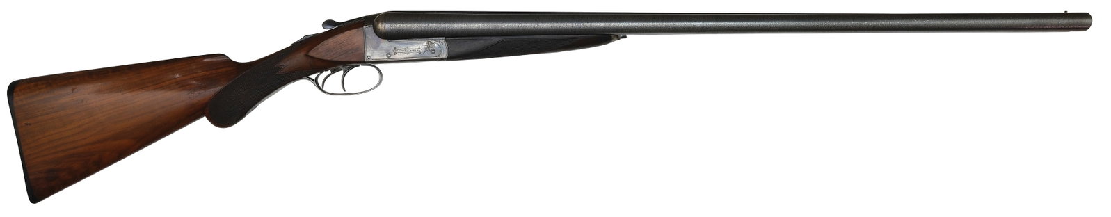 EXCELLENT ORIGINAL REMINGTON MODEL 1894 BE 12 GAUGE SHOTGUN.: SN. 110689. Cal. 12ga. Built with 30" damascus brls that have slightly raised matted top rib with brass front bead. Rib with usual legend. Splinter forend checkered in point pattern with lightly engra