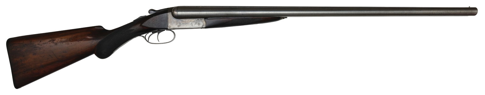SCARCE REMINGTON 1894 BE GRADE 12 GAUGE SHOTGUN.: SN. 119406. Cal. 12ga. Built with 28" damascus brls that have slightly raised matted top rib with brass front bead. Rib engraved with maker's name. Walnut splinter forend with lightly engraved push bu