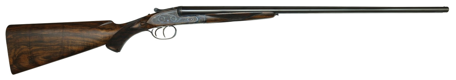 EXCEPTIONALLY FINE JAMES PURDEY AND SONS 28 BORE ASSISTED OPENING SHOTGUN WITH ORIGINAL CASE.: SN. 28327. Cal. 28ga. Proved in 1978 and built with 28" Chopperlump brls that have slightly raised matted rib with steel front bead. Tops of brls engraved "J. PURDEY & SONS" on left and "AUDLEY H
