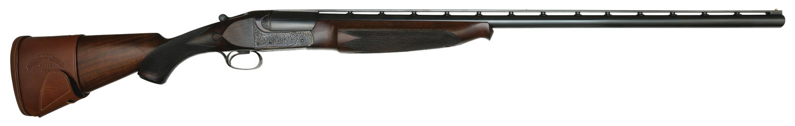 SCARCE WESTLEY RICHARDS SINGLE BARREL TRAP 12 BORE SHOTGUN.: SN. T6379. Cal. 12ga. Built with 32" brl that has raised matted ventilated top rib with twin white beads. Left side of brl hand engraved "WESTLEY RICHARDS & CO. LONDON". Left brl lump stamped "BA