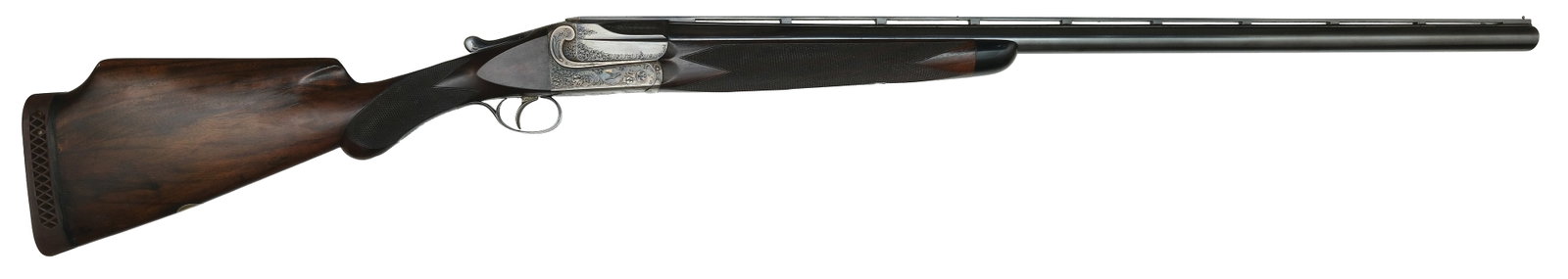 SCARCE AND FINE W.W. GREENER 12 BORE SINGLE BARREL TRAP SHOTGUN.: SN. 67164. Cal. 12ga. Built with 32" matted ventilated rib brl that has steel mid and front beads. Top of brl engraved "W.W. GREENER MAKER, 29 PALL MALL. LONDON. S.W.". Breech end of brl is nicely scr