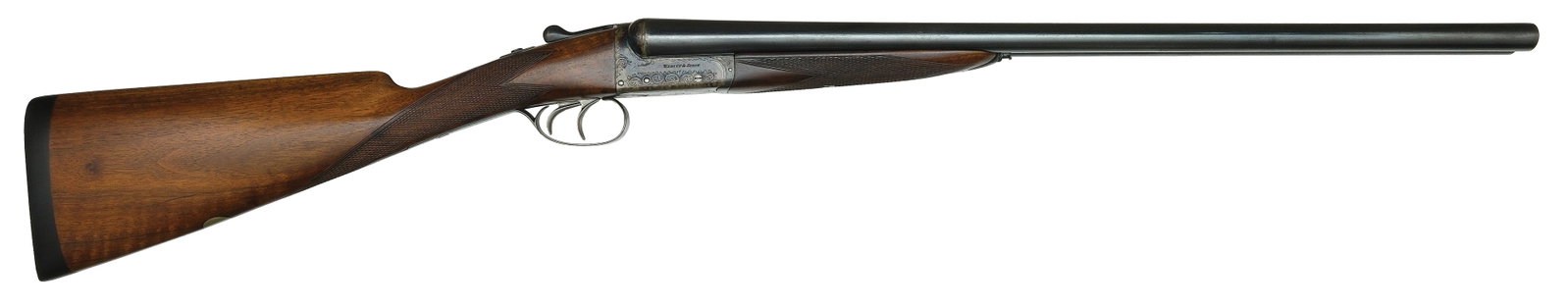 WEBLEY & SCOTT MODEL 700 LIGHTWEIGHT 12 BORE SHOTGUN.: SN. 135454. Cal. 12ga. Built with 25" brls that have concave top rib with small brass front bead. Brl flats with proof stamps. Walnut splinter forend with Anson type push button release and light