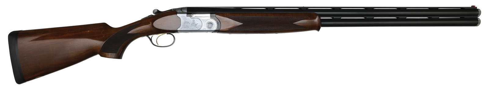 DURABLE BERETTA S687 12 BORE SHOTGUN.: SN. E83528B. Cal. 12ga. Proved in 1988 and built with 28" matted ventilated rib brls that have steel mid and fluorescent front beads. Schnabel tipped walnut forend is point pattern checkered on sides 
