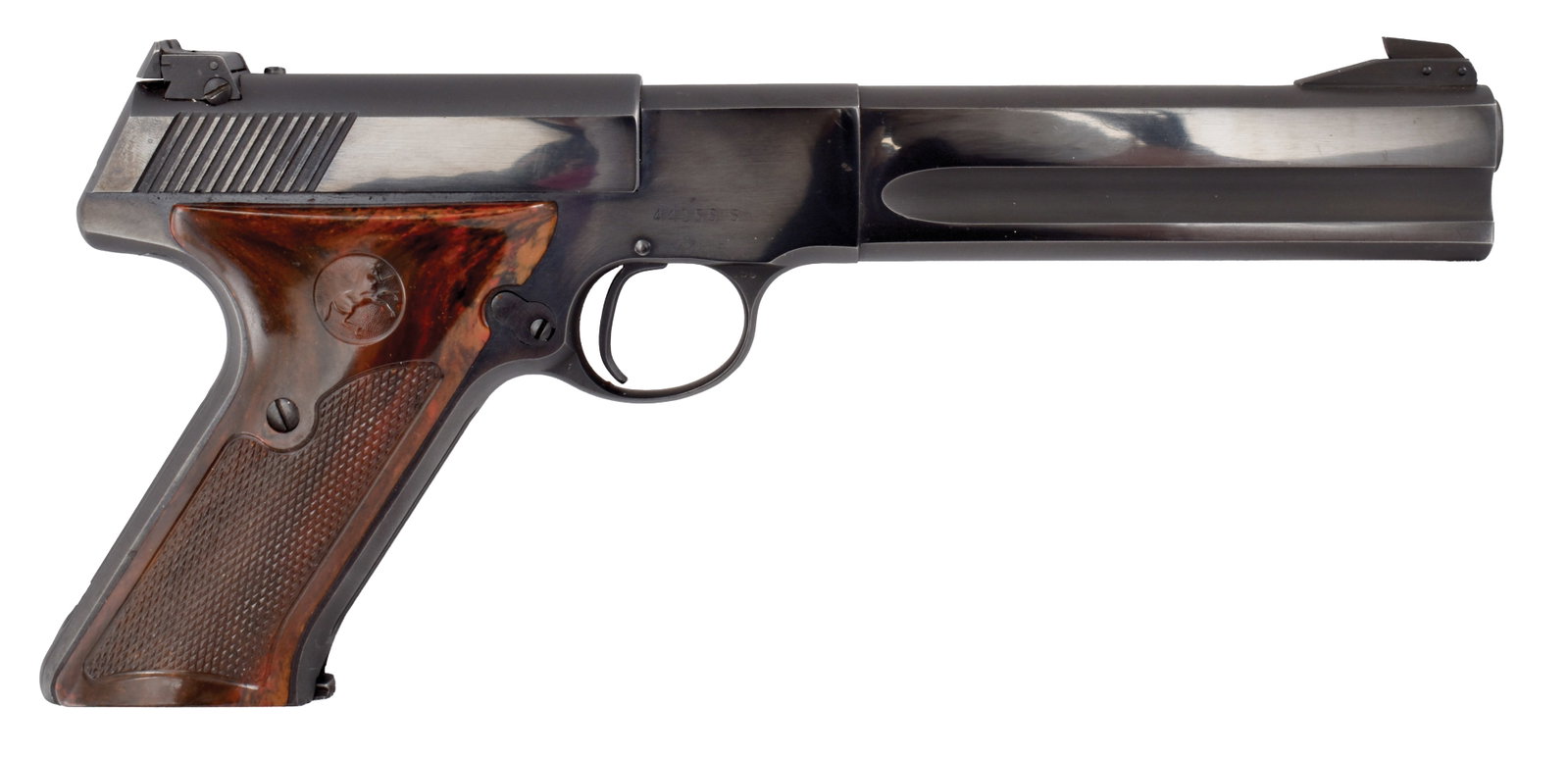 NEAR MINT EARLY PRODUCTION COLT MATCH TARGET WITH ORIGINAL BOX.: SN. 44156-S. Cal. .22LR. Built with 6" brl. Left side with usual maker's stamps. Factory original grips are checkered and with thumbs rest on side. Original magazine. Housed in its original box