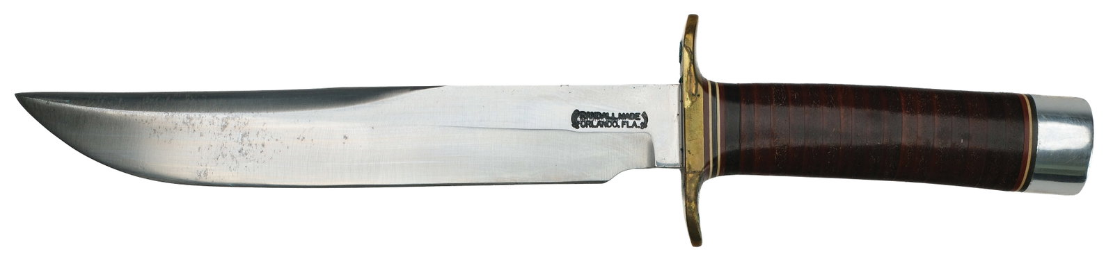 Randall Made Knives: Vintage 1-6 Fighter with a carbon steel blade fitted with a metallic and leather handle. Overall length of 12.75" with a 7" cutting edge. Comes with original single stitch sheath.