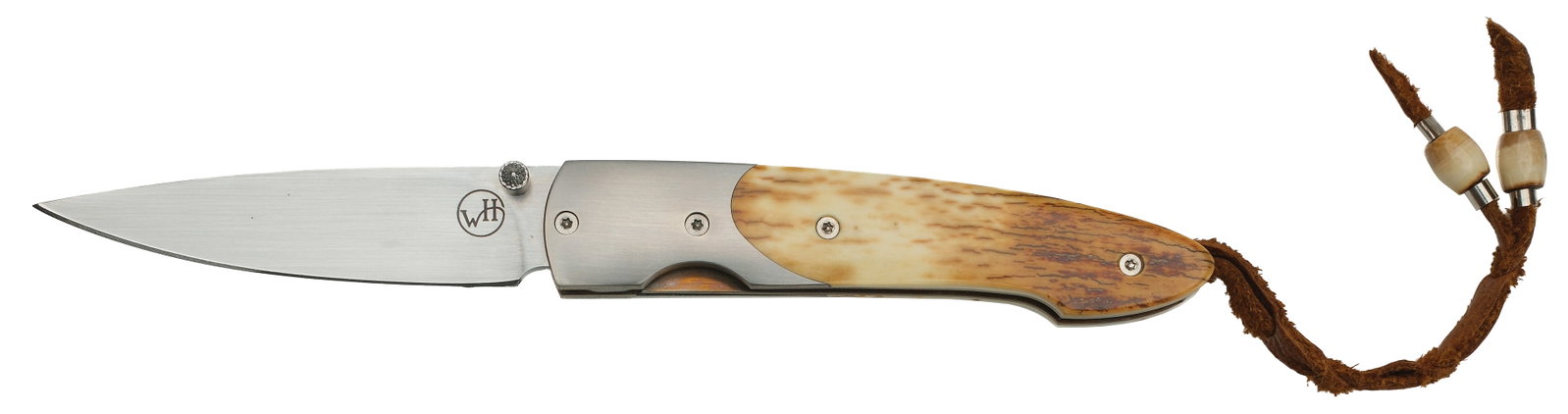 William Henry fine Knives: Steel blade with a fine antler handle. Overall length 6.25" with a 2.5" cutting edge. 