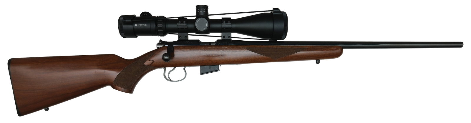 CLEAN CZ 452-2E ZKM AMERICAN IN .17 HMR WITH SCOPE.: SN. 847462 Cal. .17HMR. Built with a 22" blued tapered brl. Accompanied with a Vortex Viper 4x16x50MM 30MM tube scope with illuminated reticle. Grooved receiver on a walnut stock with point checkered 