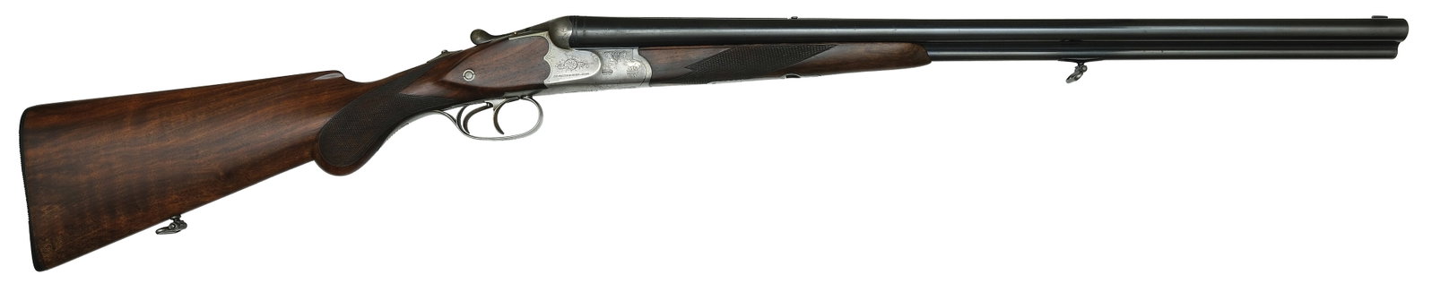 LIGHTWEIGHT DRILLING BY J.P. SAUER & SOHN OF PRE WAR MANUFACTURE.: SN. 269224. Cal. 16gax8.57J.R. Built with 25-5/8" Krupp steel brls that have matted top rib with flip up rear sight and blade front sight. Rifle brl with sling mount and brl flats with nitro proof sta