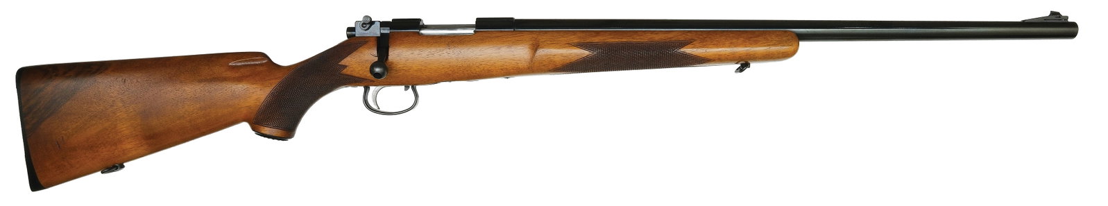 EXCELLENT SAKO RIIHIMAKI RIFLE IN .222 CALIBER.: SN. 29802. Cal. .222. Built with 24" blued round brl that has ramp blade front sight. Grooved receiver with usual maker's stamps. Numbers matching bolt. Honey colored walnut stock is point pattern che