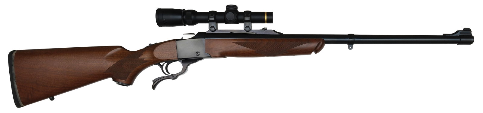 EXCELLENT RUGER MODEL NO. 1 CARBINE WITH SCOPE IN 450/400 NITRO EXPRESS.: SN. 134-24967. Cal. 450/400 NE. Built with 23" blued round brl. Walnut forend checkered in point pattern on sides. Blued falling block action. Capped pistol grip walnut buttstock is checkered through 