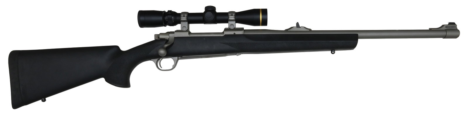 RUGER M77 HAWKEYE BOLT ACTION RIFLE WITH SCOPE.: SN. 710-74099 Cal. 416 Ruger. Made with 20” round heavy brl with usual stamps on top, caliber marking on left side at breech end, stainless steel frame. Synthetic Hougue stock with textured