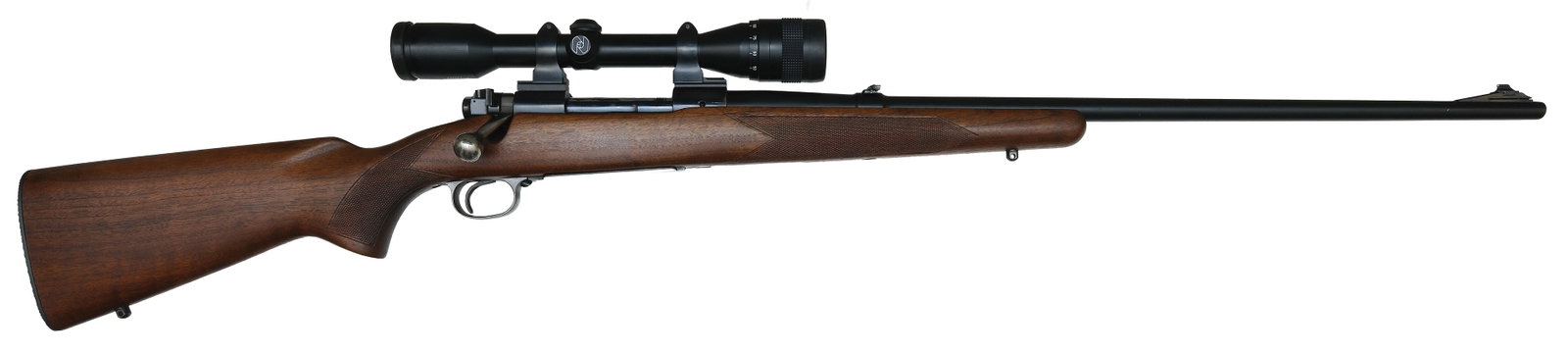 EXCEPTIONALLY CLEAN PRE '64 WINCHESTER MODEL 70 IN .220 SWIFT WITH ZEISS SCOPE, AMMO, AND DIES.: SN. 132582. Cal. .220 Swift. Built in 1950 with 26" pencil brl that has flip up rear sight and ramp blade front sight. Brl with usual maker's stamps. Blued receiver which is currently mounted with a Z