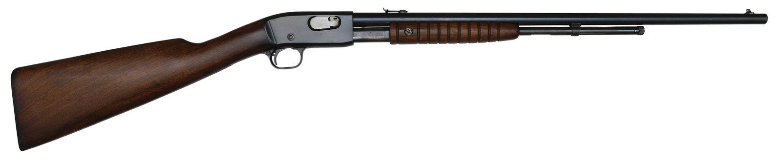REMINGTON MODEL 12 PUMP .22 CAL.: SN. 746076. Cal. .22 S.L.LR. Built with 21" round brl that has usual maker's stamps and Remington patents on left side. Grooved walnut forend. Blued action with usual maker's stamps. Straight walnut b