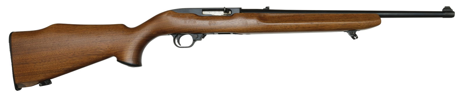FIRST YEAR PRODUCTION RUGER 10/22 CARBINE.: SN. 60195. Cal. .22LR. Built with 18-1/2" blued round brl that has flip up rear sight and blade front sight. 10rd detachable magazine. Smooth full length walnut stock finger groove at fore and capped 