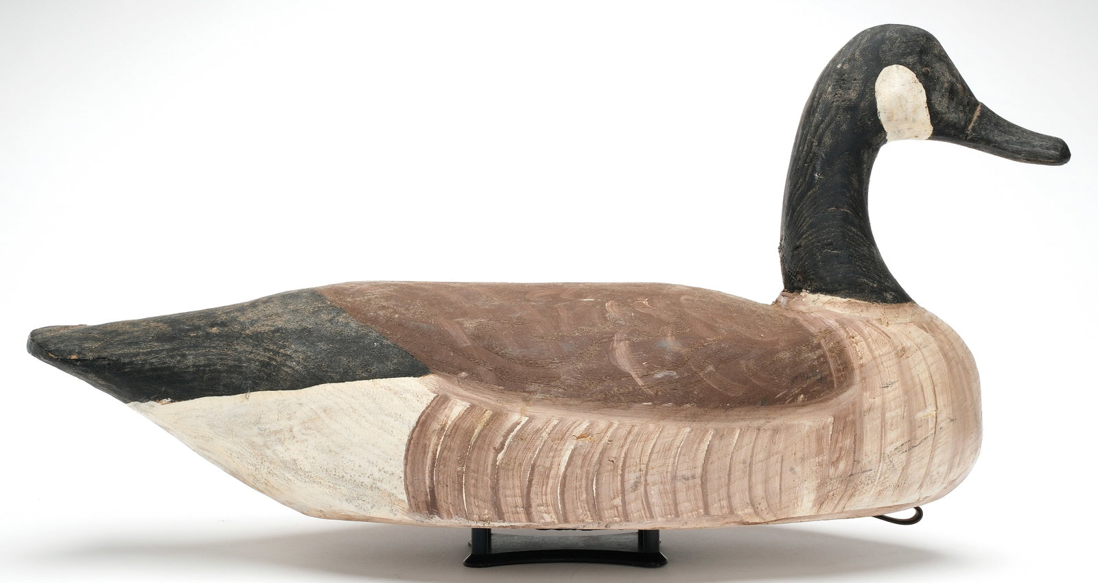 Miles Hancock (1887-1974), Chincoteague, Virginia.: Canada goose. Cotton wood construction with tack eyes. Measures 25" long. PROVENANCE: Oliver Smith collection.