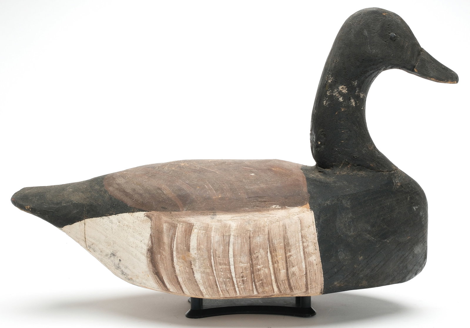 Miles Hancock (1887-1974), Chincoteague, Virginia.: Brant. Cotton wood construction with tack eyes. Measures 16" long. PROVENANCE: Oliver Smith collection.
