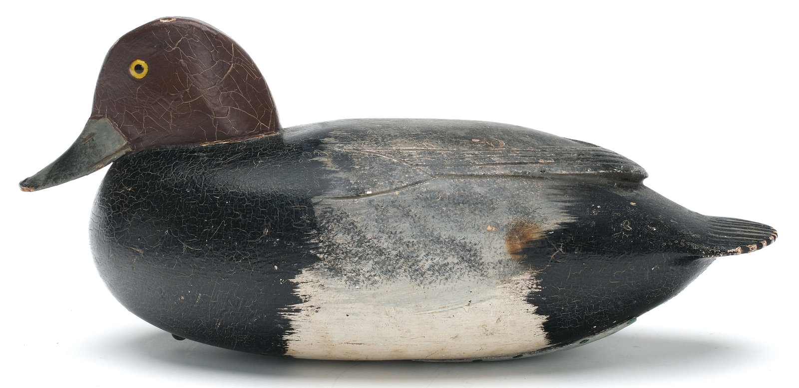 Caleb Ridgway “Ridge” Marter (1893-1977), Burlington, New Jersey.: Low head redhead. Hollow carved with raised V wingtip carving. Maker's metal rig tag on underside. Measures 13.75" long. PROVENANCE: John Decesare collection.