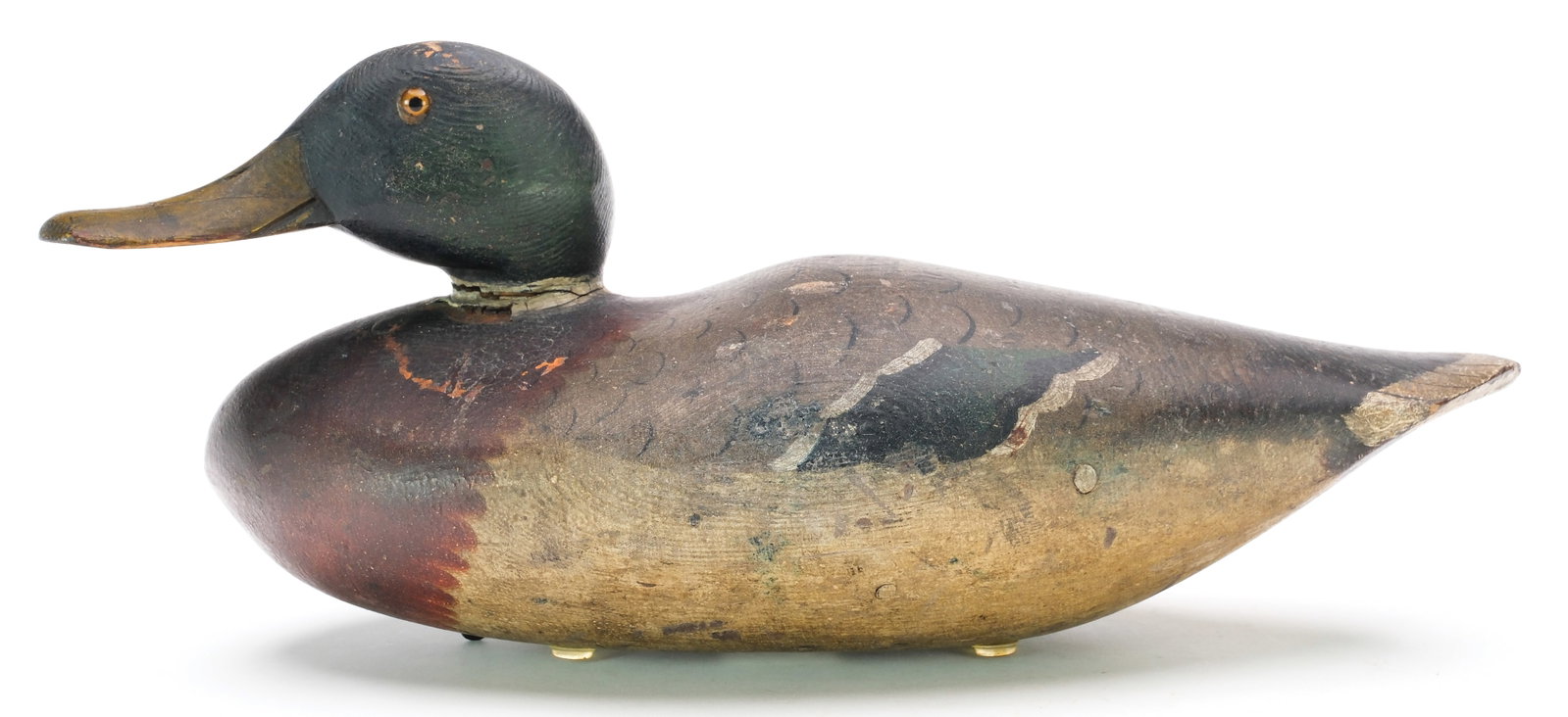 Mason Decoy Factory (1889-1924), Detroit, Michigan.: Very early mallard. Slope breasted challenge grade model with slightly turned head. Measures 15.5" long. PROVENANCE: Len Carnaghi collection.