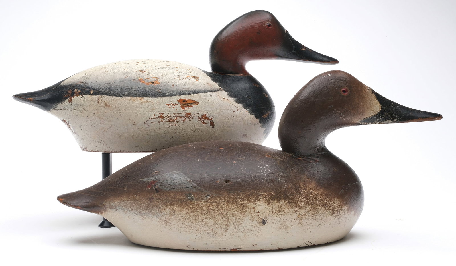 Mason Decoy Factory (1889-1924), Detroit, Michigan.: Rigmate pair of canvasbacks. Hollow carved premier grade. Measure 15" long.