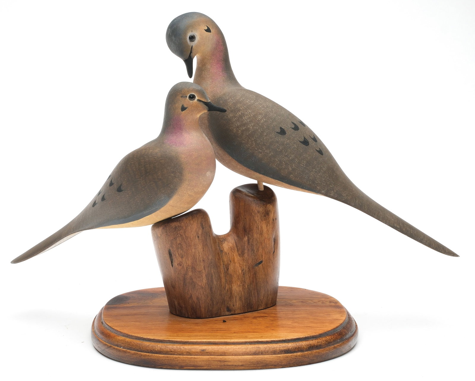 Harold Haertel (1904-1995), Dundee, Illinois.: Pair of mourning doves. Signed and dated 1995 on underside of base. Dove measure 10" and 12" long.