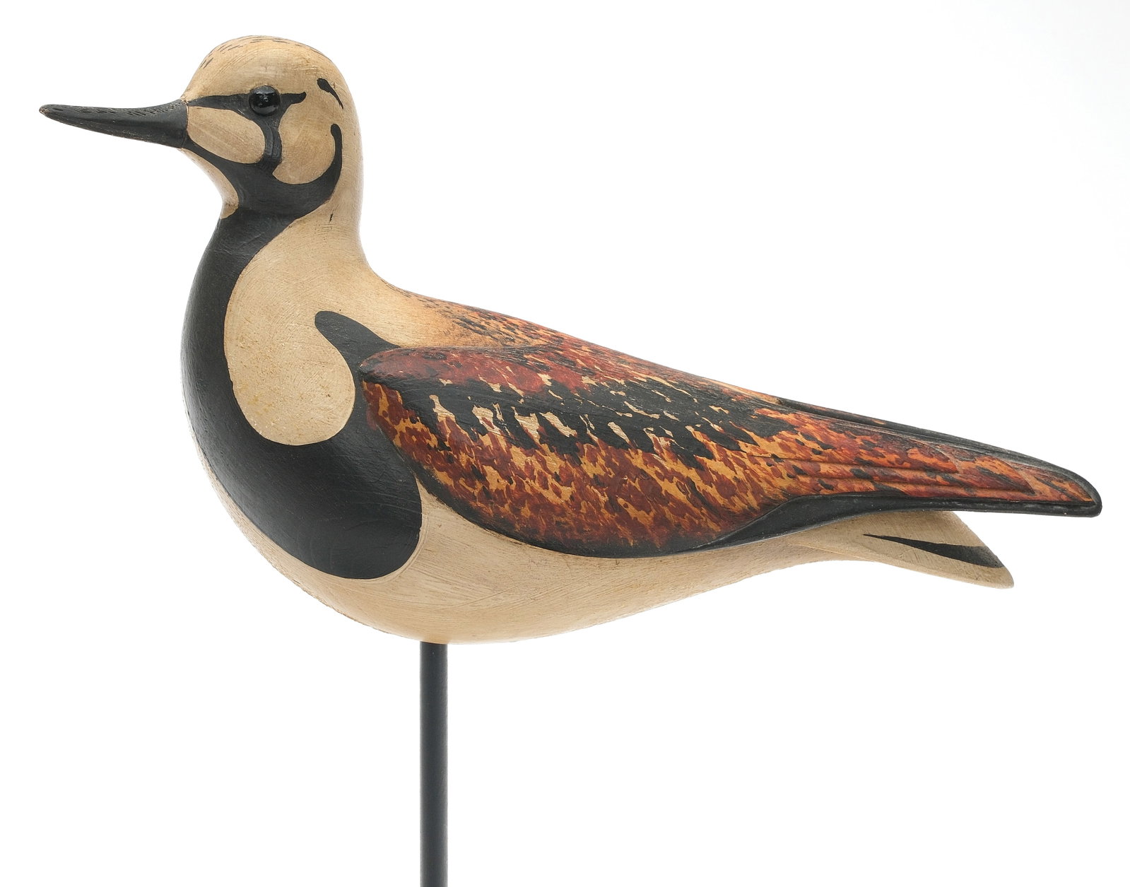 William Gibian (b.1946), Onancock, Virginia.: Ruddy turnstone. Deep relief wing carving with extended wingtips. Slightly turned head. "Gibian" carved in underside. Measures 9.5" long.