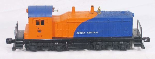 NETTE - Scarce LIONEL 611 JC NW-2 Diesel: Painted Blue & Orange Version, hairline screw crack, chips around 1 stack, o/w C7 Tough!