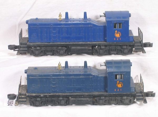 NETTE - 2 Versions LIONEL 621 JC 44-Ton Diesels: 1 is dark teal, hairline screw crack goes above screw; Royal blue version, small hairline screw crack, should clean to C6+ or better
