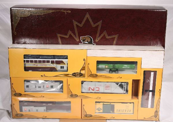 NETTE - LIONEL/ MPC 1981 Maple Leaf Ltd. SSS 1158: 8152 GP-9 Diesel; 6305 Tank; 9441 Box; 6103 Hopper; 9440 Box; 6508 Crane; 6433 Caboose, Factory sealed, C10