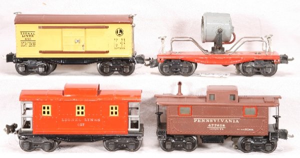 NETTE - 4 LIONEL Freight Cars:: 2620 Searchlight car, gray light(1942 only), C6; 657 Caboose, RS lettering, C6; 655 Boxcar, MBC; 2757 PRR Caboose, o/w C7