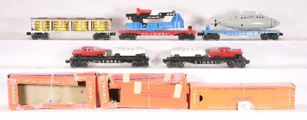 NETTE - 5 LIONEL Freight Cars:: 2 #6424 Auto Loaders, red cars are repros; 6650 ICBM Launcher, rough ob; 3830 Sub Flat, hole in flat, repro sub incomplete, rough ob; 6475 Pickle Car, 1 broken step, ob, o/w C7