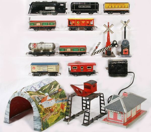 NETTE - 15 Pc. MARX Train Set, Plus: Tunnel; Over track Derrick; Girard Station; Transformer; Bell Signal; Crossing gate; CV Loco, plated scratched off 1 side; NYC Tender; 553 Tank; 2 #552 Gondolas; 567 Tipple, C8; 556 Caboose; 554 8-whe