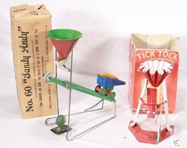 NETTE - 2 Pc. Boxed Sand Toy Lot: Wolverine #60 Sandy Andy, missing string and sand can, ob used as base for toy; Tick Tock Sand Shovel, Litho tin, rough ob, C7 ish