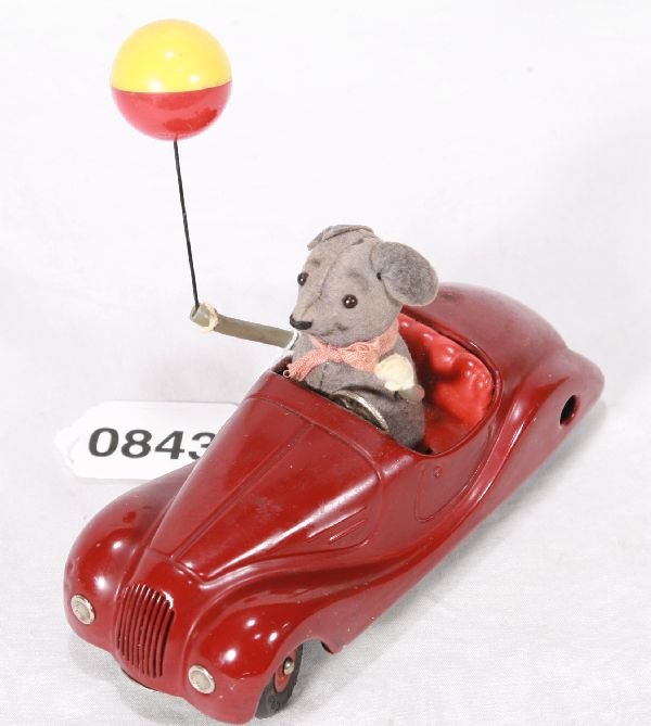 NETTE - Maroon SCHUCO 2005 Sonny: Litho tin, clock work working, small oxi spot on trunk o/w would polish up nicely, mouse is clean w/nice nap, glove on balloon hand worn, o/w C7