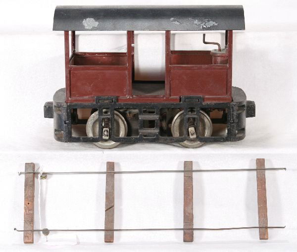 NETTE - LIONEL B&O 5 2 7/8 Ga. Loco: Tin w/cast iron frame, motor is complete & original though rewired, 1 side lettering barely readable from flaking, other side restored minus lettering, nice original roof(C6+). Small pc track included
