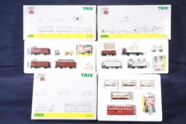 NETTE - TRIX HO Sets 24026, 66158 & 24028:: 24029 Ship's Provisions Freight Car Set for W. Hermann & Cons; 66158 Port Vehicles Set; 24028 Coffee Transport Set, obs C8+ - 9