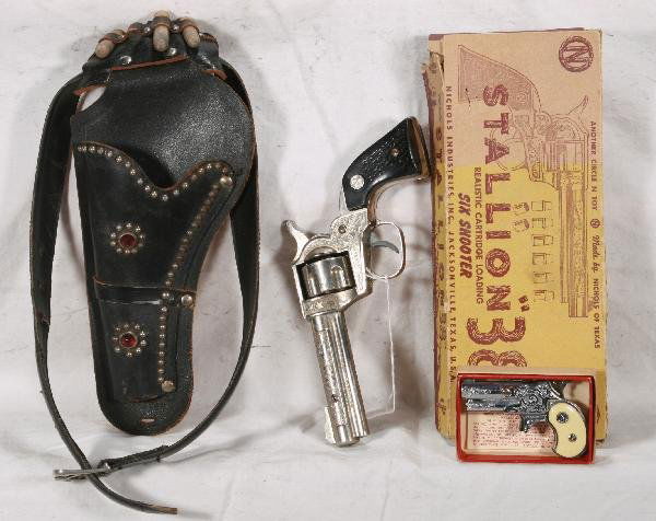 NETTE - 3 Pc. NICHOLS Cap Pistol Lot: Stallion 38 empty box missing flaps 1 side; Dyna-mite Derringer, ob w/instr. Sheet, C9; Stallion 32 w/holster & 3 bullets, not working completely, o/w C7+