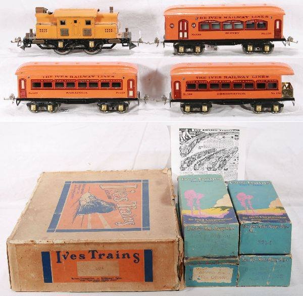 NETTE - Boxed IVES Montgomery Wards Set:: #504 as illustrated in 1930 Catalog copy(included) Scarce 3254 Loco, intact frame, though flaking; 130 Combine; 129 Saratoga Coach; 132 Obsv., cars have scenic boxes, osb a bit worn, o/w C7 Nice!