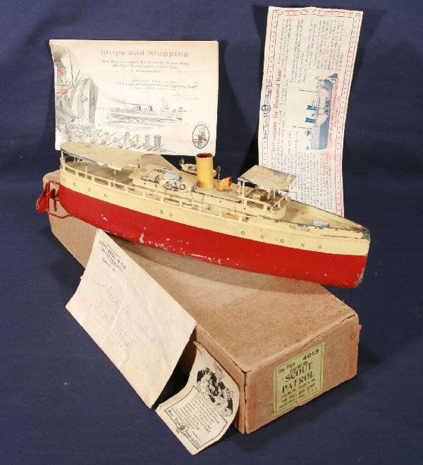 NETTE - Super Boxed IVES 4013 Scout Patrol Boat: One of the hardest Ives boats to find, especially with this much paint! HP Tin, 13" L, clock work working w/key; nice Roamer RS lettering and original litho flag, some minor flaking as always, but ret