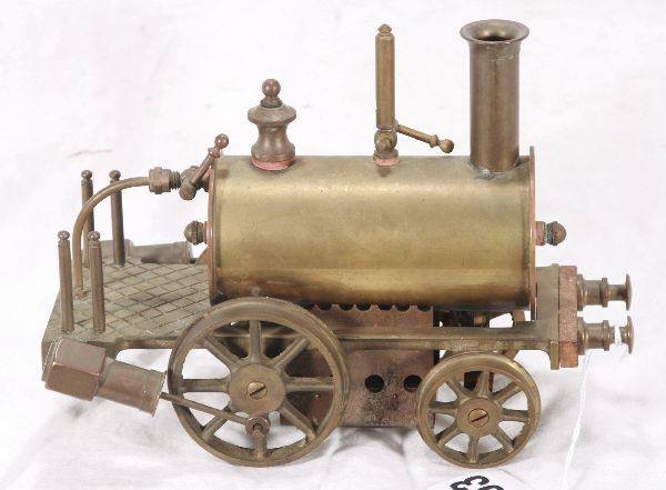 NETTE - BASSETTE-LOWKE Live Steam Dribbler:: 2 3/4" Ga., floor toy, complete w/burner tray, probably missing flaunt, unpainted brass, C7+