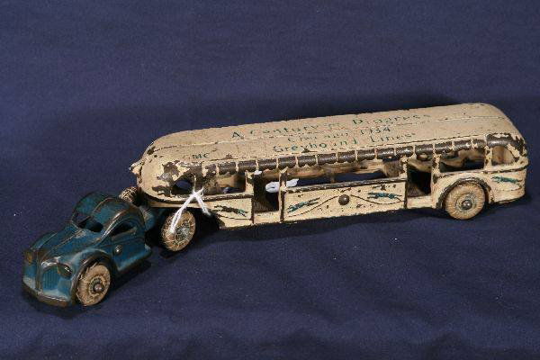 NETTE - ARCADE Greyhound World's Fair Bus: Century of Progress 1934, 10" L, PCI w/white rubber tires, second largest size, intact w/normal play wear, C6-