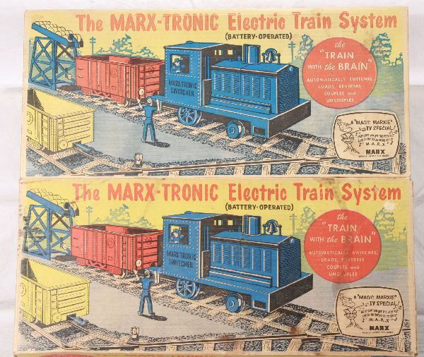 NETTE - 2 Boxed MARX-A-Tronic Sets: #2893, both same variations w/yellow barrels, Bat. Op Locos(untested) w/red & yellow Gondolas, 2 different figures, 1 larger missing broom, both have track, 1 has crossover, Uncoupler & bomber as well