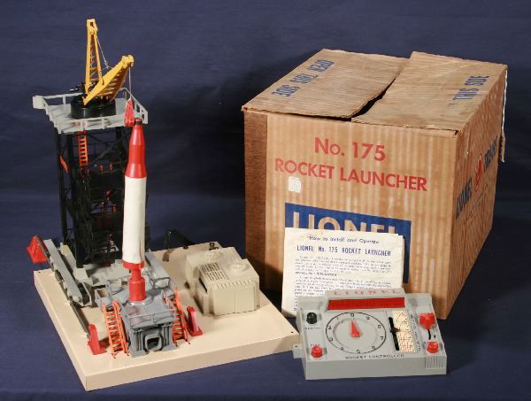 NETTE - Boxed LIONEL 175 Rocket Launcher: Clean w/nice controller decals; a few cracked rails on lower platform, rocket worn, needs wiring, ob nice, o/w C7