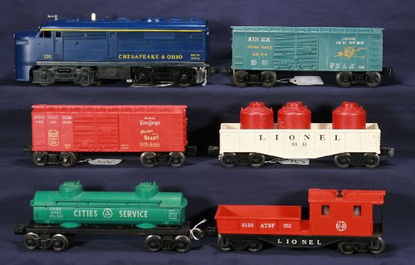 NETTE - 6 Pc. LIONEL 230 Diesel Freight Set: 230 C&O Alco A Diesel; tougher Teal blue 6044 Airex Boxcar; 6112 Gondola w/3 Canisters; 638-2361 Van Camps Bank Car, tougher light red w/dimple catwalk; 6465 CS Tank Car; 6130 SF Work Caboose, C7-