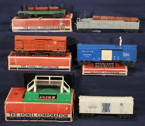 NETTE - 5 LIONEL Freight Cars, some boxed: 3461X Lumber Dump, green, rough ob; 3562-25 Barrel Car w/load & bin; 3472 Milk Car w/platform, cream car, cans inside, ob w/insert; 3656 Oper. Cattalo Car, car only, ob; 3424 Brakeman Car w/partial Te