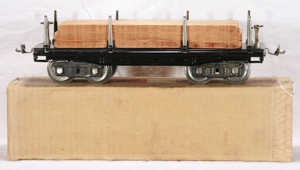 NETTE - Nice Boxed LIONEL 211 Lumber Car:: ST. Ga.; Clean & shiny w/light run time, original loaded nicely aged, bright nickel, clean, has 1/16" light oxi spot on 1 end of frame, ob dated 1927, o/w C8 Nice!