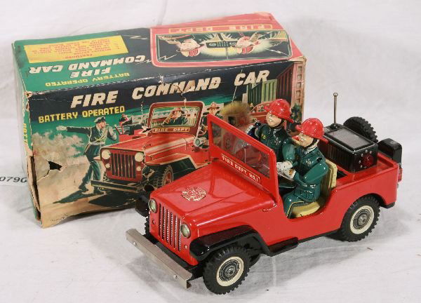 NETTE - Boxed Fire Command Car Toy: Bat. Op, working, 11" W, Lights & sound, passenger raises and lowers hand, fun toy! Ob is worn, C9